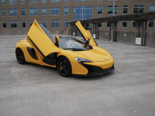 Yellow Color stunning McLaren 650s Spider available for rent at Capital Exotic car rental in DMV