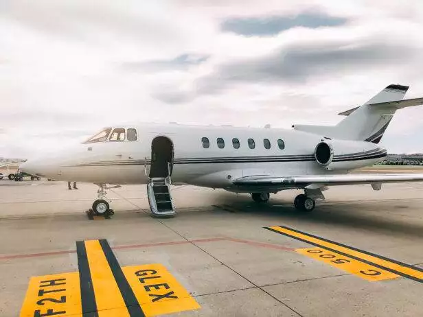Private luxury jet at the airport terminal runway | Luxury Living | exotic rental cars near me | exotic rentals